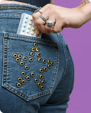 A girl pulling birth control pills from Planned Parenthood Direct out of pocket